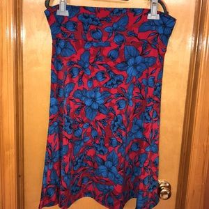 A-line red skirt with blue floral pattern